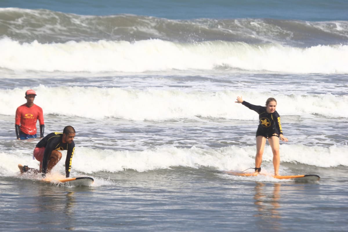 Surfing Lessons by Odysseys Surf School