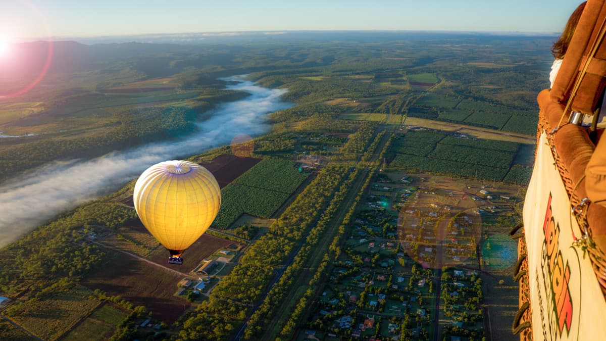 Sunrise Hot Air Balloon Flight near Cairns with Sparkling Wine and Optional Round Trip Transfer