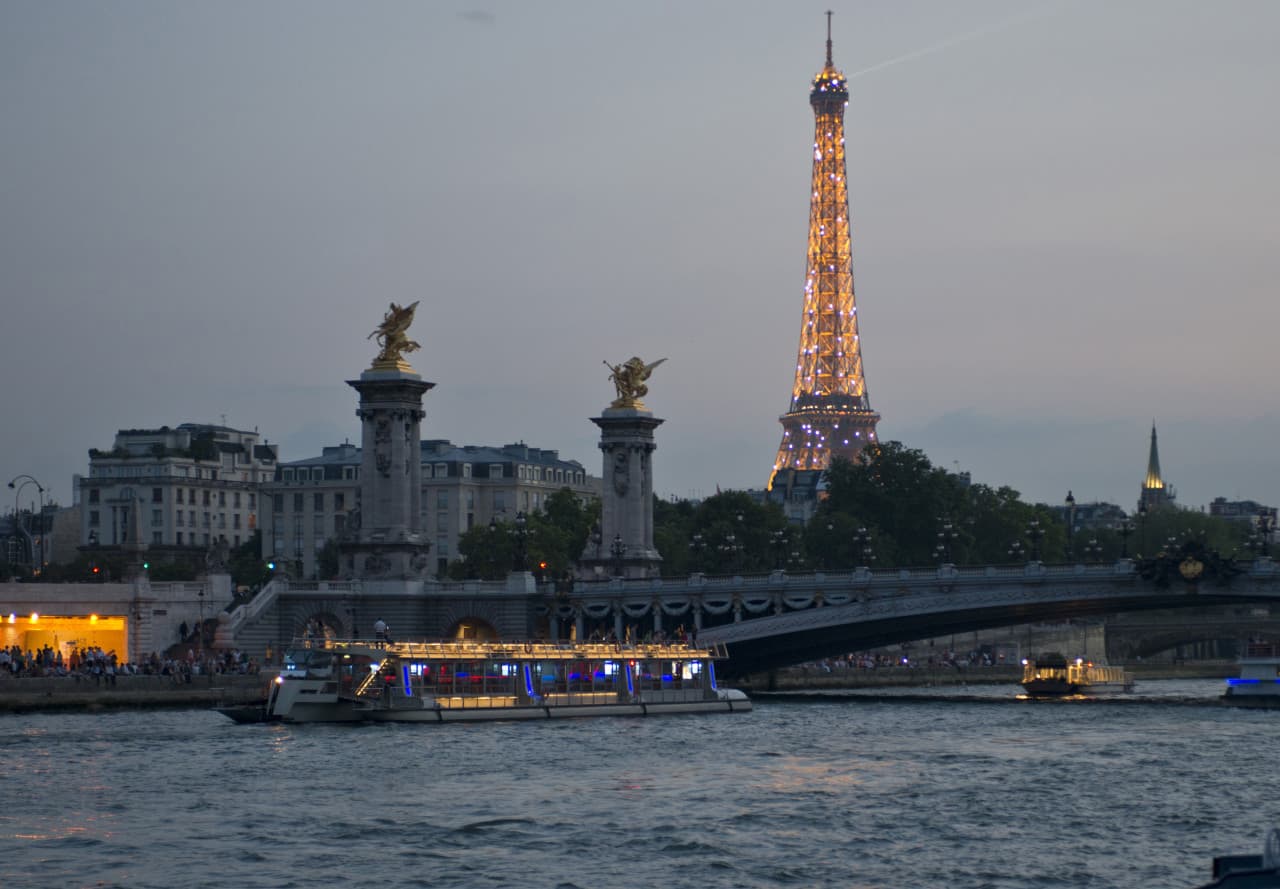 Paris Open-Top Bus Tour, Seine River Cruise, and Eiffel Tower Dining Experience