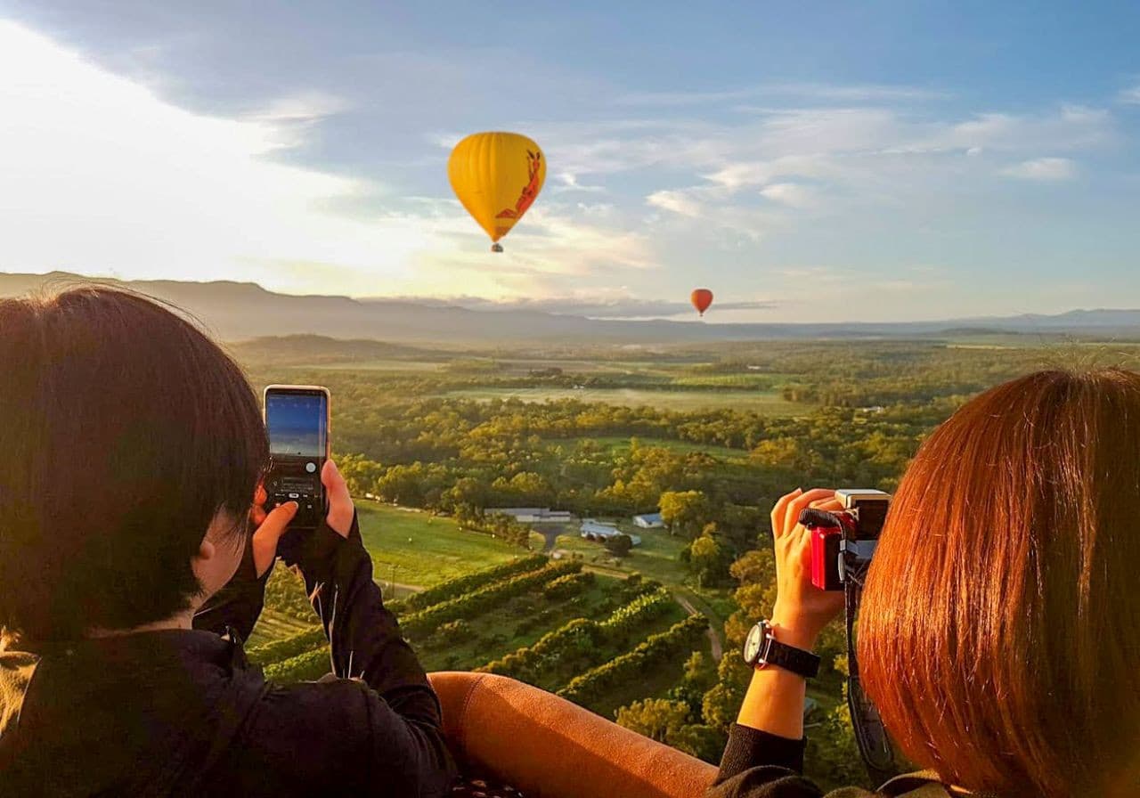 Sunrise Hot Air Balloon Flight near Cairns with Sparkling Wine and Optional Round Trip Transfer