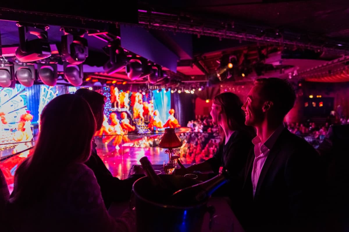 Moulin Rouge Cabaret Show with Drop-off Service and Seine River Cruise